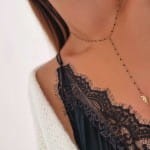 Naszyjnik body chain skrzydło stal chirurgiczna emalia czarne koraliki