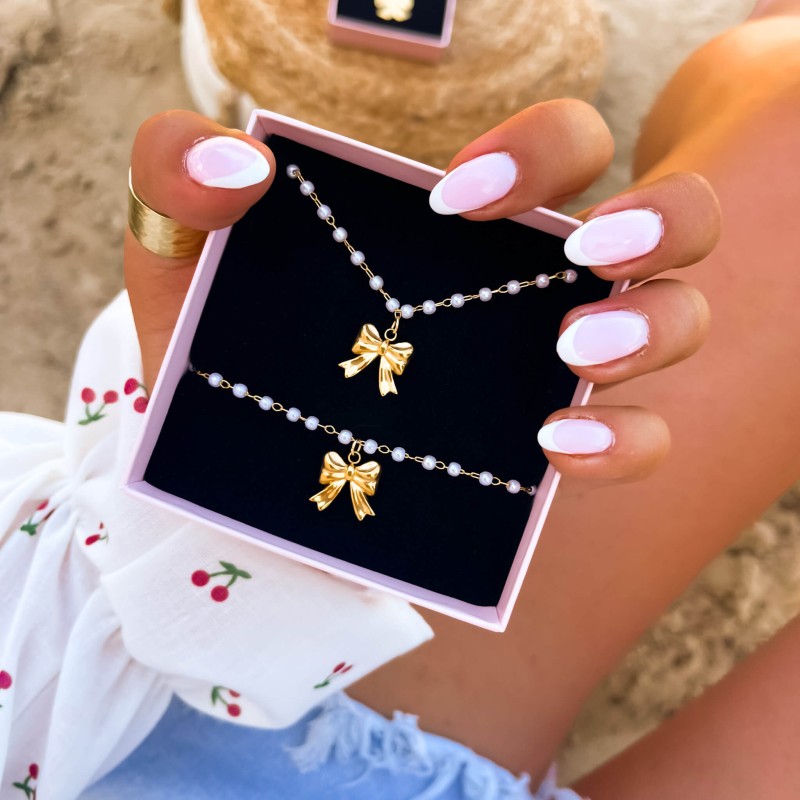 Bransoletka ze stali szlachetnej z kokardką koraliki perełki