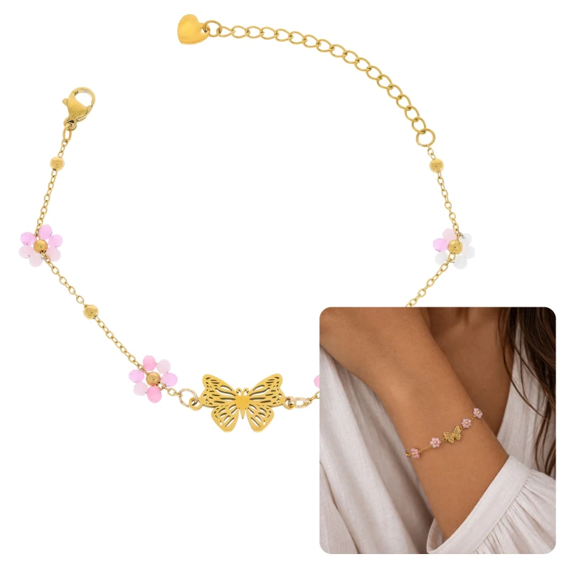 Bransoletka damska z motylem i kwiatkami ze stali chirurgicznej pokazana na nadgarstku i na białym tle, elegancka i lekka biżuteria dla kobiet